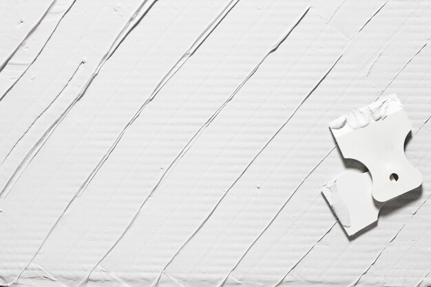 Plaster Background White Spatula Repair Building Material Free Space Repair Design Concept