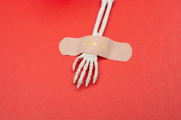 Plaster band on Bones of the Skeletal human hand