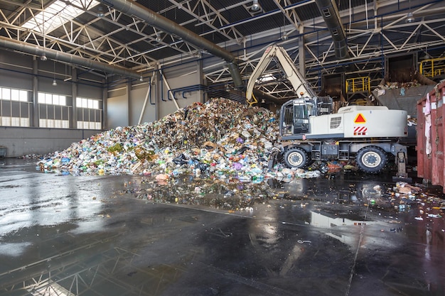 Plastic bales at the waste processing plant separate garbage\
collection recycling and storage of waste for further disposal\
business for sorting and processing of waste