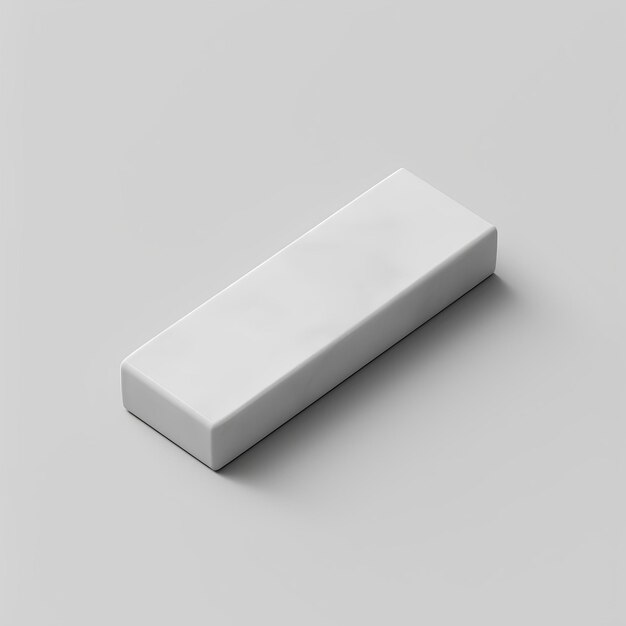 A plastic bar is laying on a gray surface