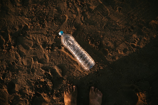 Plastic bottle abandoned on the beach in the Mediterranean.