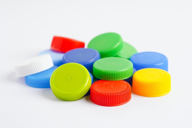 Plastic bottle caps colorful for recycle on white background