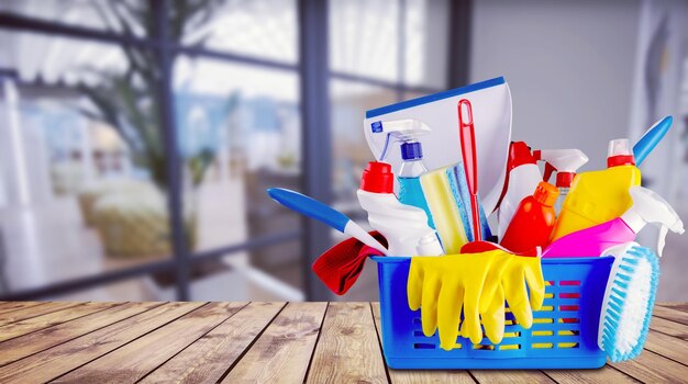 Plastic bottles, cleaning sponge and gloves  on background