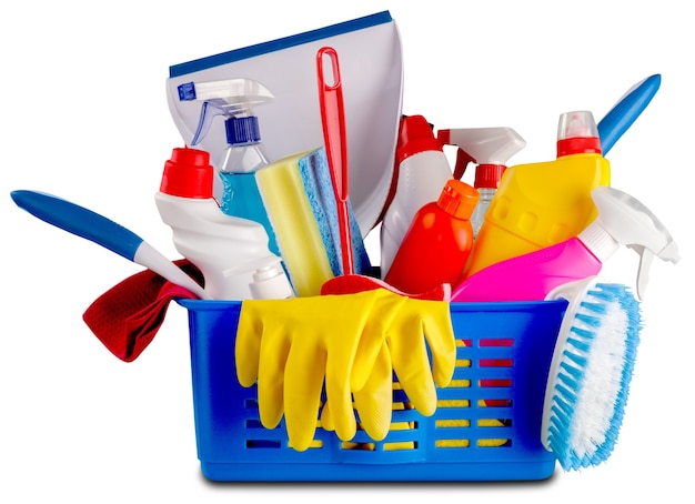 Plastic bottles and cleaning sponges on white background