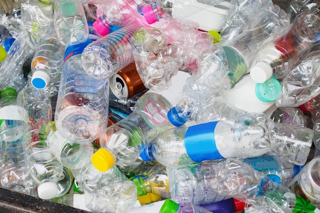 Plastic bottles in recycle trash station close up