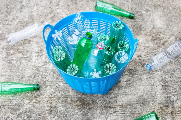 Plastic bottles in waste basket.