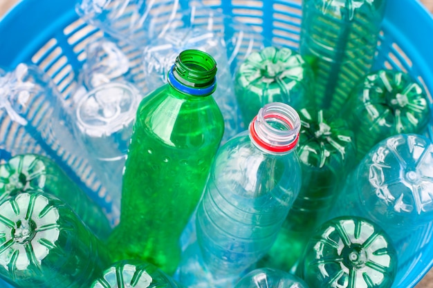 Plastic bottles in waste basket.