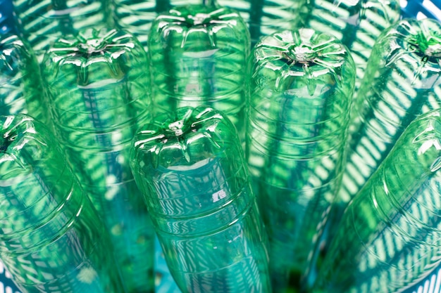 Plastic bottles in waste basket.