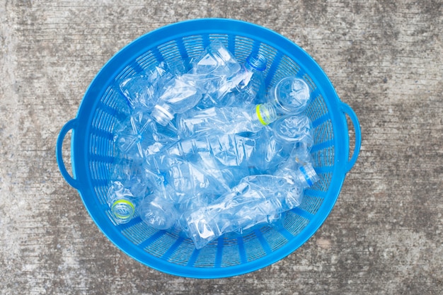 Plastic bottles in waste basket.