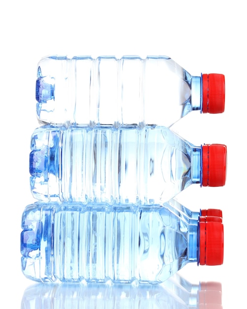 Plastic bottles of water isolated on white