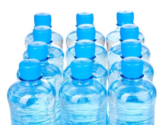 Plastic bottles of water isolated on white