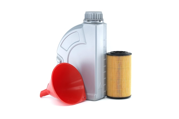 Plastic canister of motor oil alongside a yellow and black oil filter and a red plastic funnel