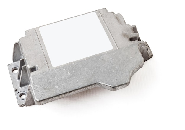 Plastic car engine control unit with metal elements on a white isolated background is the connecting center of various subsystems units and assemblies Monitoring the state of the moment Spare part