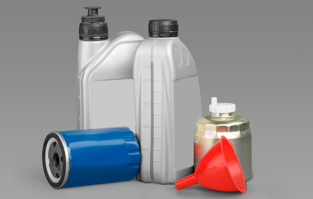 Photo plastic containers for motor oil on background