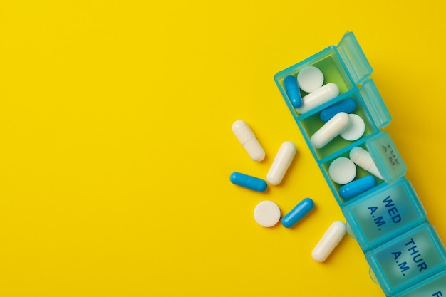 Plastic containers with pills isolated