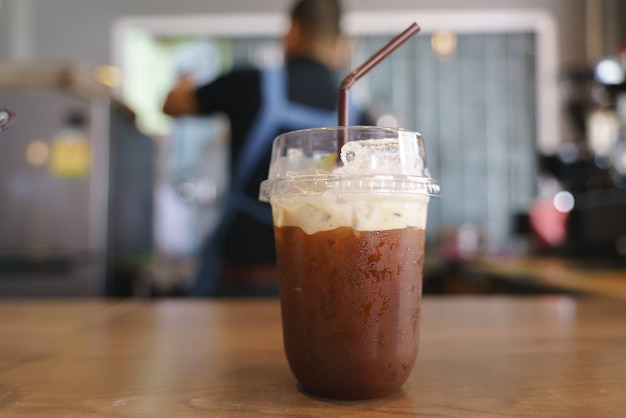 Photo plastic cup of iced cold brew coffee