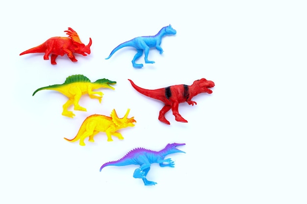 Plastic dinosaurusspeelgoed op witte achtergrond Bovenaanzicht