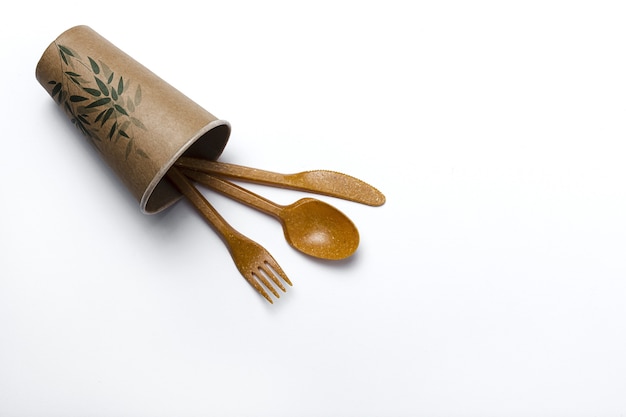 Plastic disposable tableware, forks, spoons, glasses. Recycling concept. Zero plastic