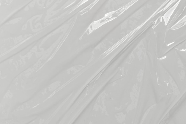 Foto plastic doorzichtige cellofaant zak op witte achtergrond witte plastic film wrap textuur achtergrond wit plastic zak textuur