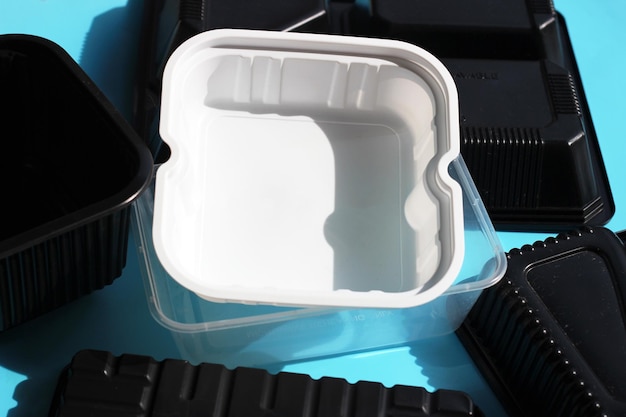 Plastic food packaging on blue background