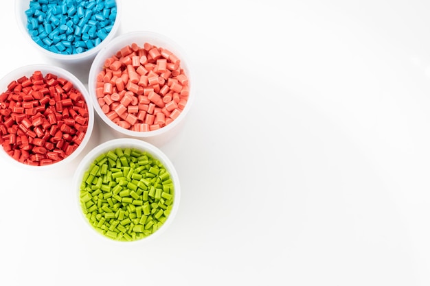 Plastic granules close up for holding,Colorful Plastic granules with white background.