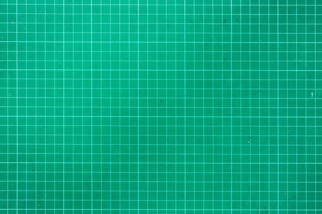 Plastic green cutting mat texture squared sheet texture green\
background