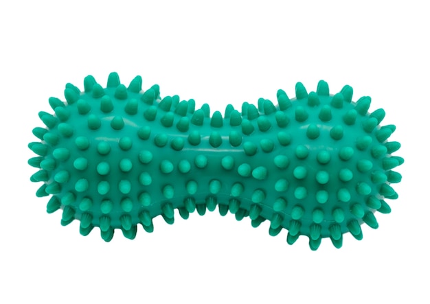 Plastic green massager with foot spikes isolated