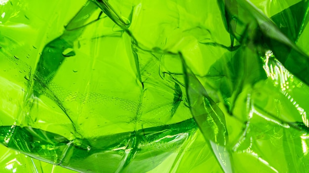 Plastic groene zak textuur achtergrond Verfrommeld polyethyleen textuur Afval recycle concept