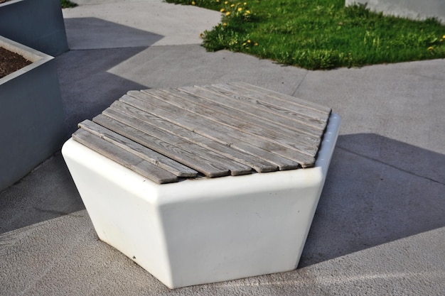 plastic hexagonal bench with wooden planks isolated, close-up