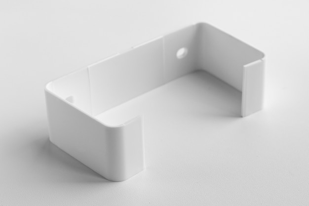 Plastic holder for direct tonel on a white background part for assembling ventilation