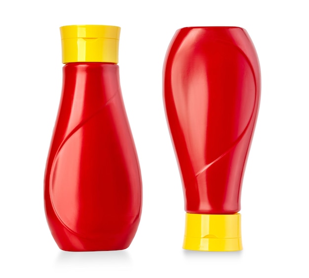 Bottiglie di ketchup in plastica isolate su bianco