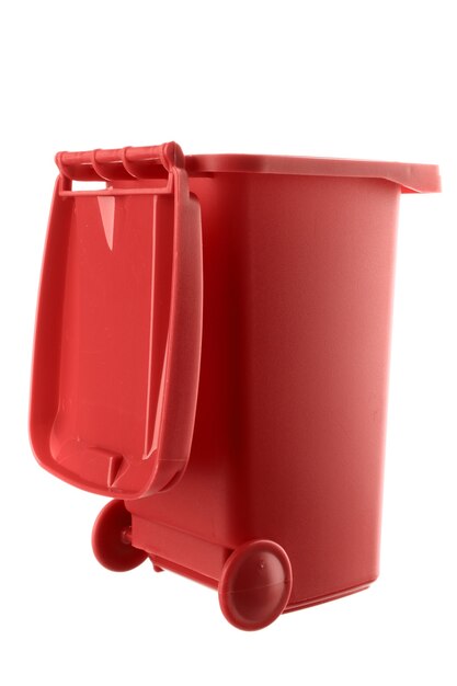 Plastic red trash can isolated on white background