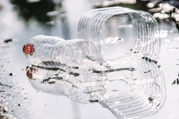 Plastic solid waste floating on the water., recycling concept