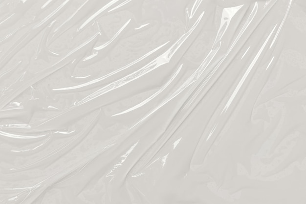 Photo plastic transparent cellophane bag on white background white plastic film wrap texture background white plastic bag texture