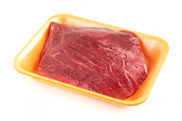 Plastic tray with raw beef