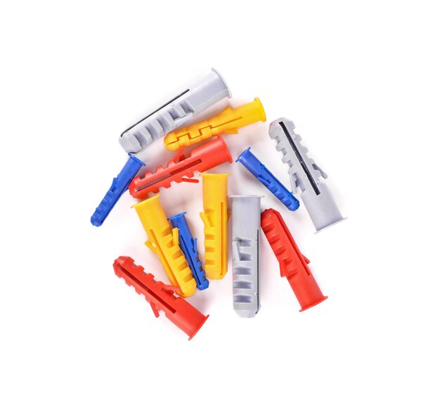 Plastic wall dowel plugs on white background