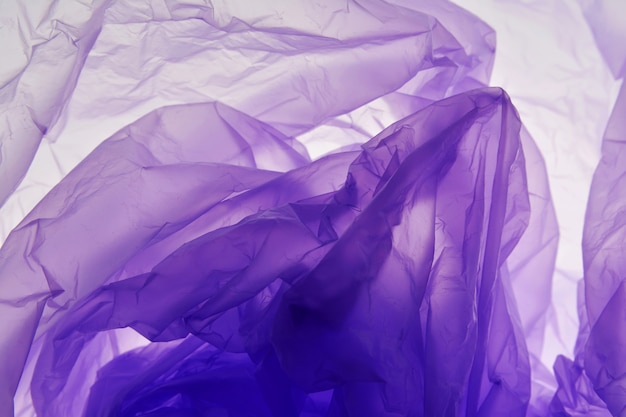 Plastic zakachtergrond. Violette textuur.