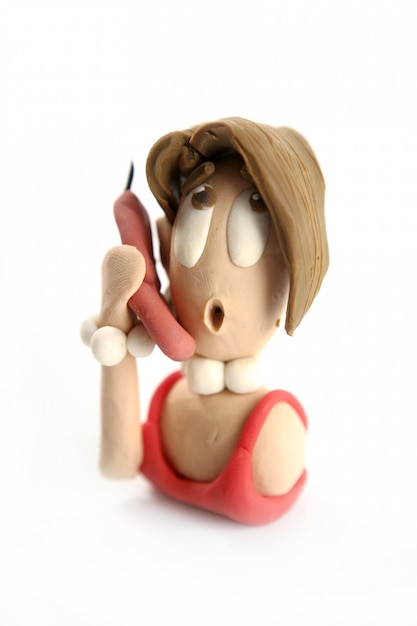 Plasticine woman secretary talking phone