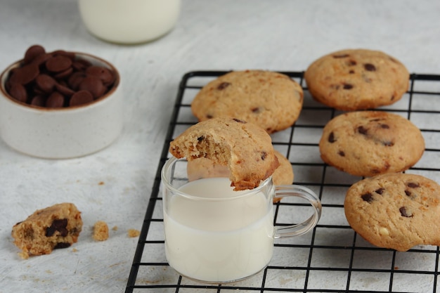 a plate of chocolate chips cookies on white background