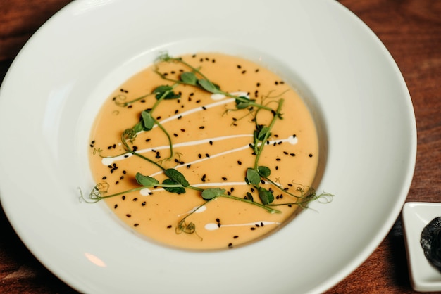 a plate of cream cheese soup