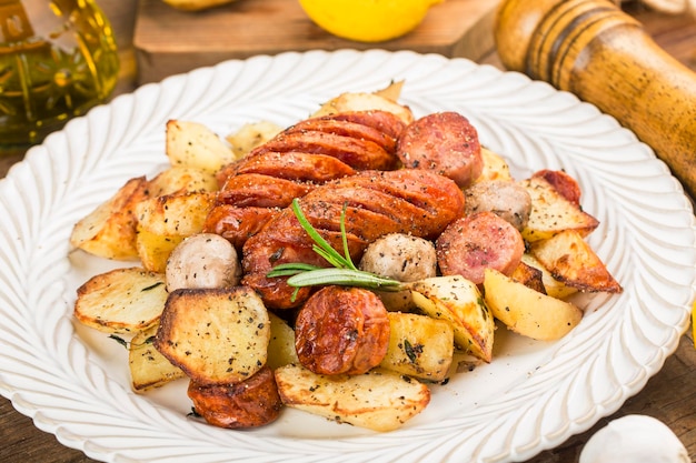 A plate of delicious potatoes and baked sausage