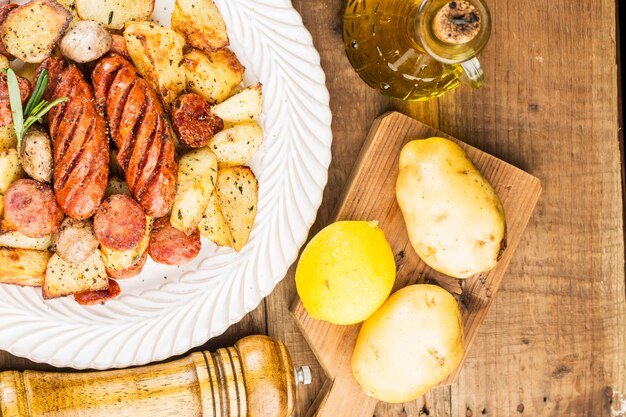 A plate of delicious potatoes and baked sausage