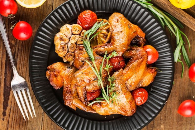 A plate of delicious roasted chicken wings