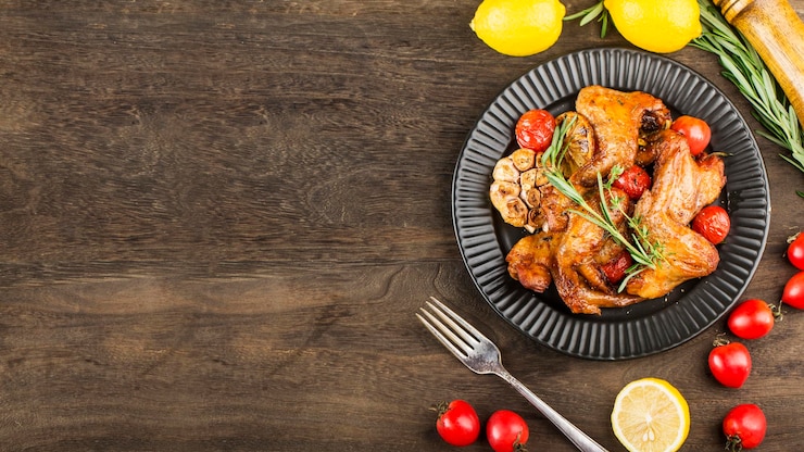Photo a plate of delicious roasted chicken wings