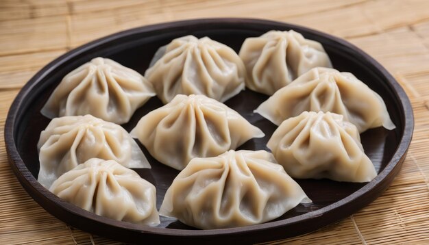 A plate of dumplings on a wooden table