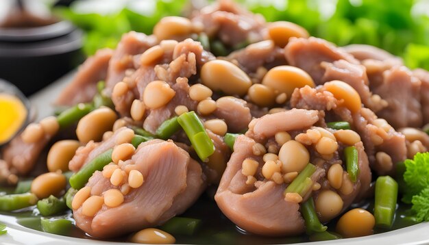 Photo a plate of food with beans and beans on it
