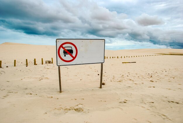 Plate, forbidden car on the beach