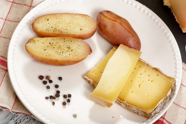 Plate of  french cheese with potatoes