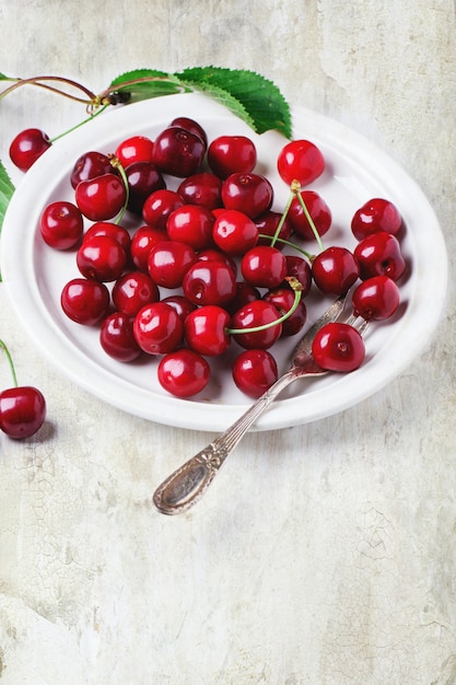 Plate of fresh cherries