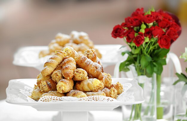 Plate of freshly baked desserts on a buffet